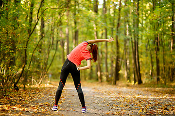 Image showing woman exercising in park