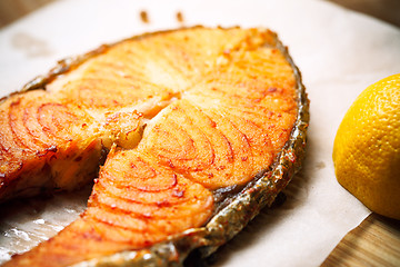 Image showing Grilled red fish steak salmon and lemon