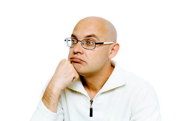 Image showing pensive man in glasses. Studio. isolated