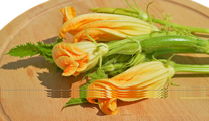 Image showing Yellow courgette blossoms