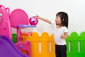 Image showing Asian Chinese little girl playing basketball