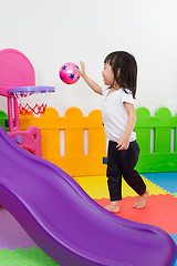 Image showing Asian Chinese little girl playing basketball