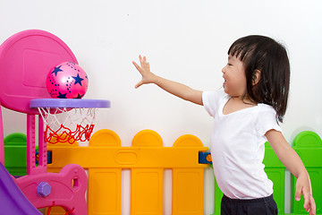 Image showing Asian Chinese little girl playing basketball