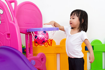 Image showing Asian Chinese little girl playing basketball