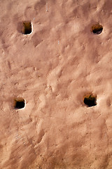 Image showing brown hole   in texture wall and  morocco  