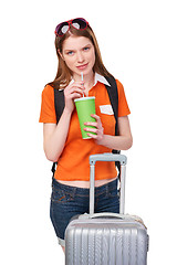 Image showing Smiling girl with backpack and suitcase