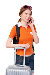 Image showing Smiling girl with backpack and suitcase