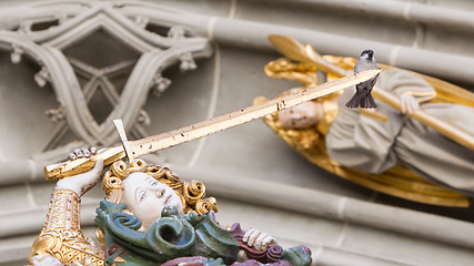 Image showing Berner Muenster, sparrow sitting on a sword