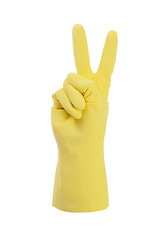 Image showing Yellow cleaning glove, victory sign