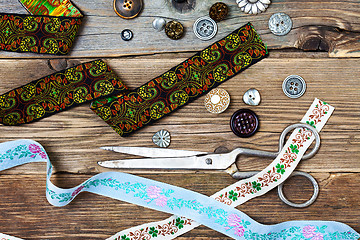 Image showing vintage lace, buttons and a dressmaker scissors