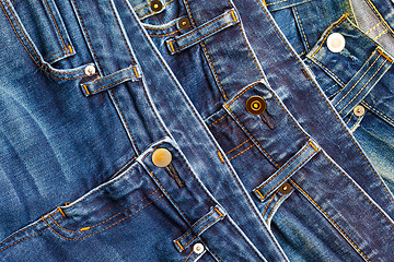 Image showing blue jeans in the store shelf