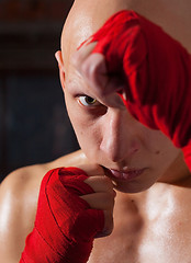 Image showing Portrait of a boxer with red bandages