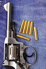 Image showing Nagant revolver with cartridges