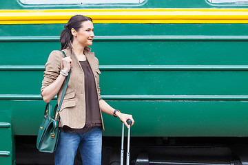 Image showing beautiful adult woman with travel bag