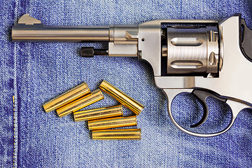 Image showing revolver with cartridges