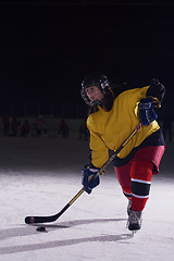 Image showing teen ice hockey player in action