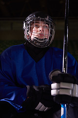 Image showing ice hockey players on bench