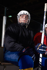 Image showing ice hockey players on bench