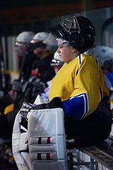 Image showing ice hockey players on bench