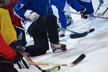 Image showing ice hockey players team meeting with trainer