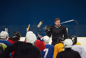 Image showing ice hockey players team meeting with trainer