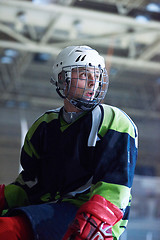 Image showing ice hockey players on bench