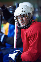 Image showing ice hockey players on bench