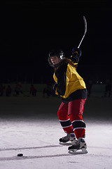 Image showing teen ice hockey player in action