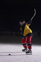 Image showing teen ice hockey player in action