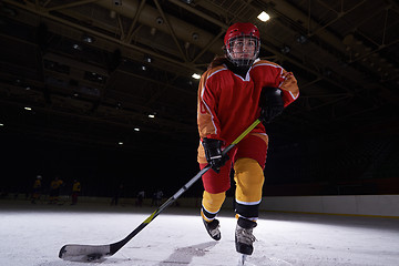 Image showing teen ice hockey player in action