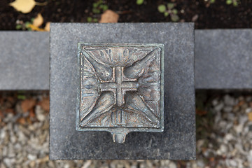 Image showing Holy water shell at the grave