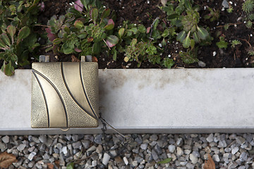 Image showing Holy water shell at the grave