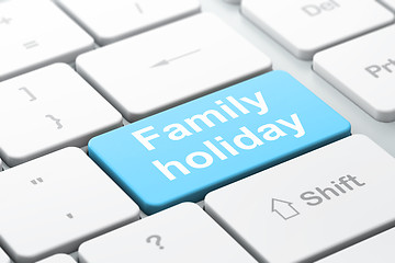 Image showing Vacation concept: Family Holiday on computer keyboard background