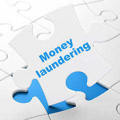 Image showing Currency concept: Money Laundering on puzzle background