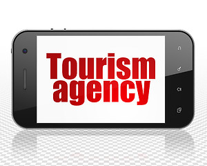 Image showing Travel concept: Smartphone with Tourism Agency on display