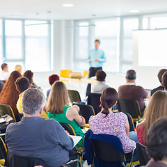 Image showing Speaker Giving a Talk at Business Meeting.