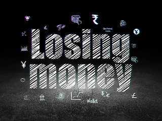 Image showing Money concept: Losing Money in grunge dark room