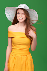 Image showing Closeup portrait of woman in straw hat