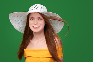 Image showing Closeup portrait of woman in straw hat