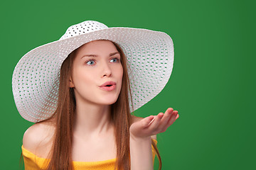 Image showing Closeup portrait of woman in straw hat