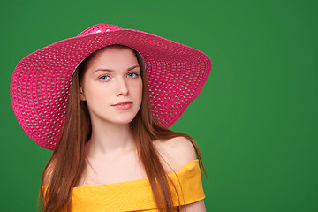 Image showing Closeup portrait of woman in straw hat