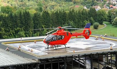 Image showing red helicopter