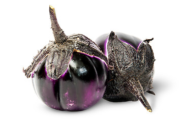 Image showing Two round eggplants mature lying near