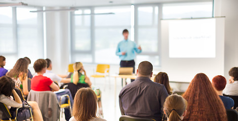 Image showing Speaker Giving a Talk at Business Meeting.