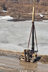 Image showing Pile driving machine in construction site. Tyumen
