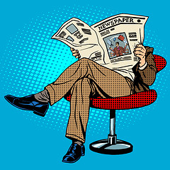 Image showing Newspaper reading man