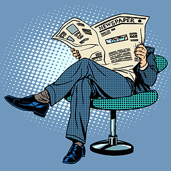 Image showing Newspaper reading man