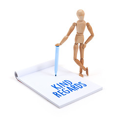 Image showing Wooden mannequin writing - Kind regards