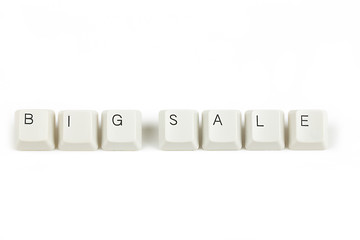 Image showing big sale from scattered keyboard keys on white
