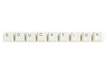 Image showing education from scattered keyboard keys on white